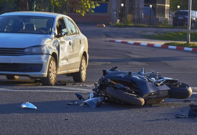 a motobike crashed into a car a motorcyclist was injured police investigation fingerprint investigator